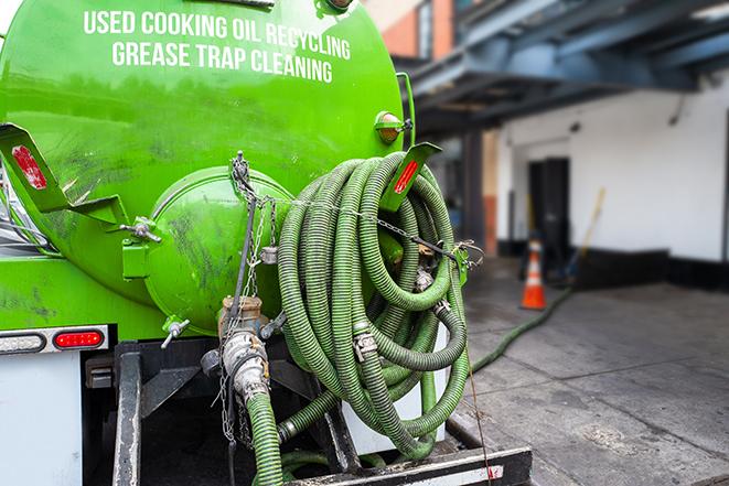 a large industrial grease trap being pumped out in Anza, CA